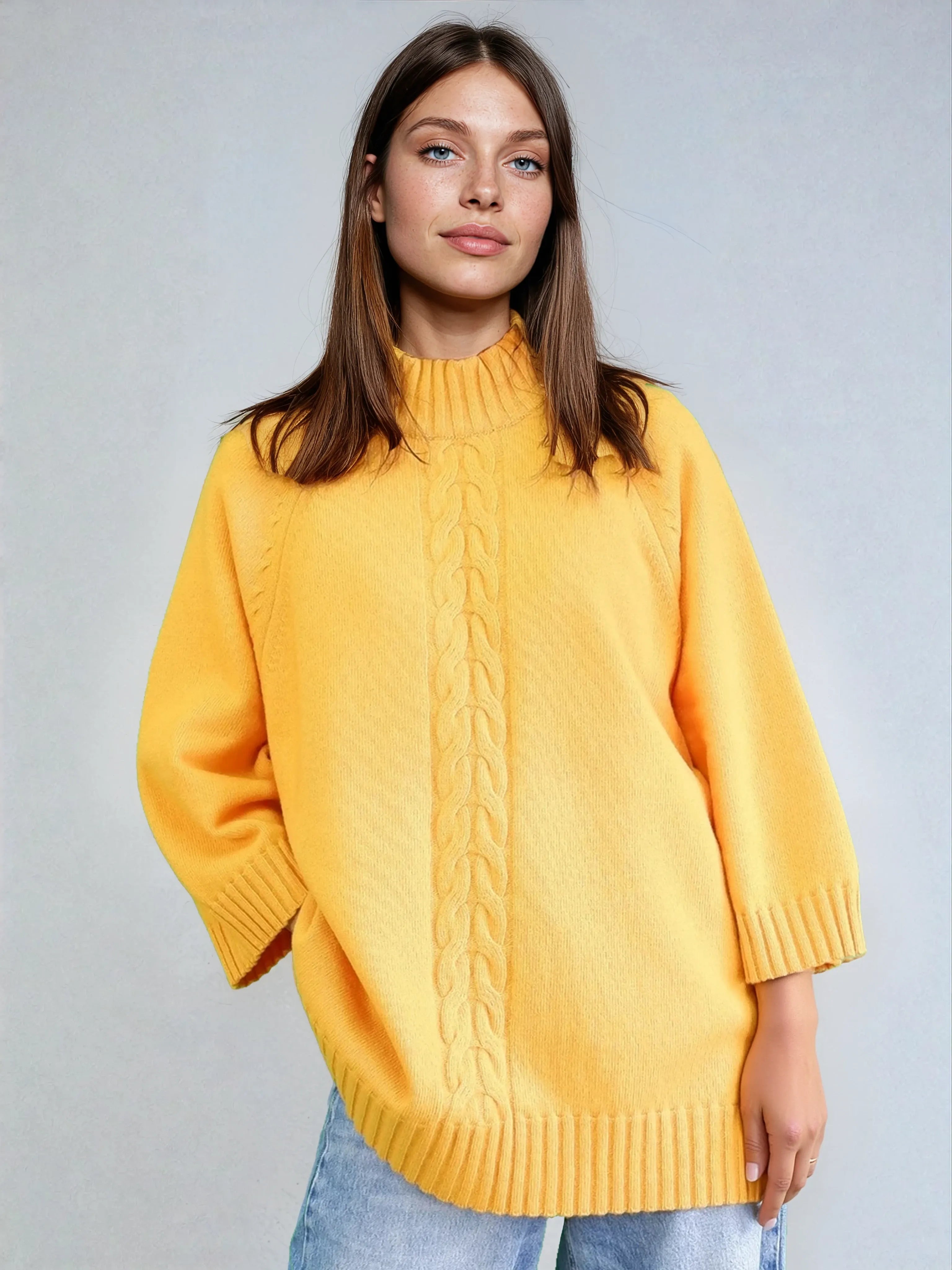 Lambswol braided poncho with buttons in yellow