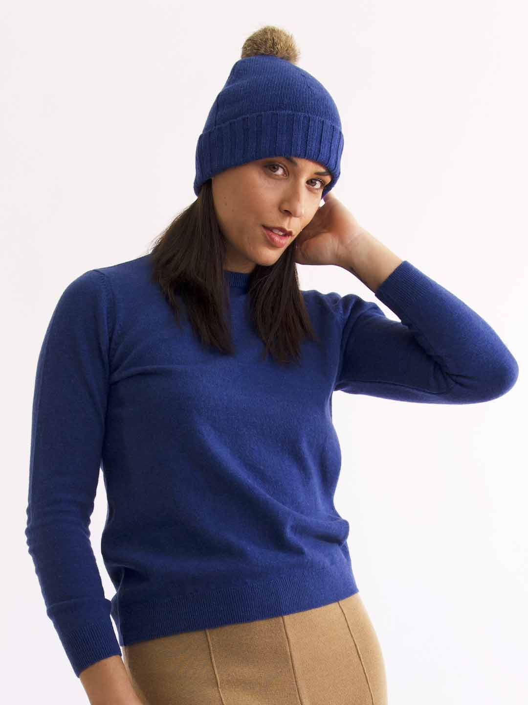 Achega Knitted Hats - Women's pompom hat in indigo blue lambswool