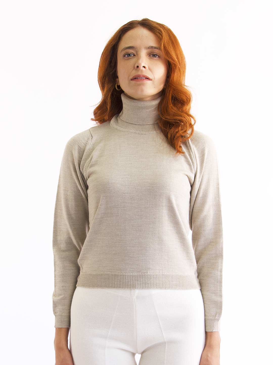 Achega Knit Sweaters - Women's merino wool sweater with high collar in sand color