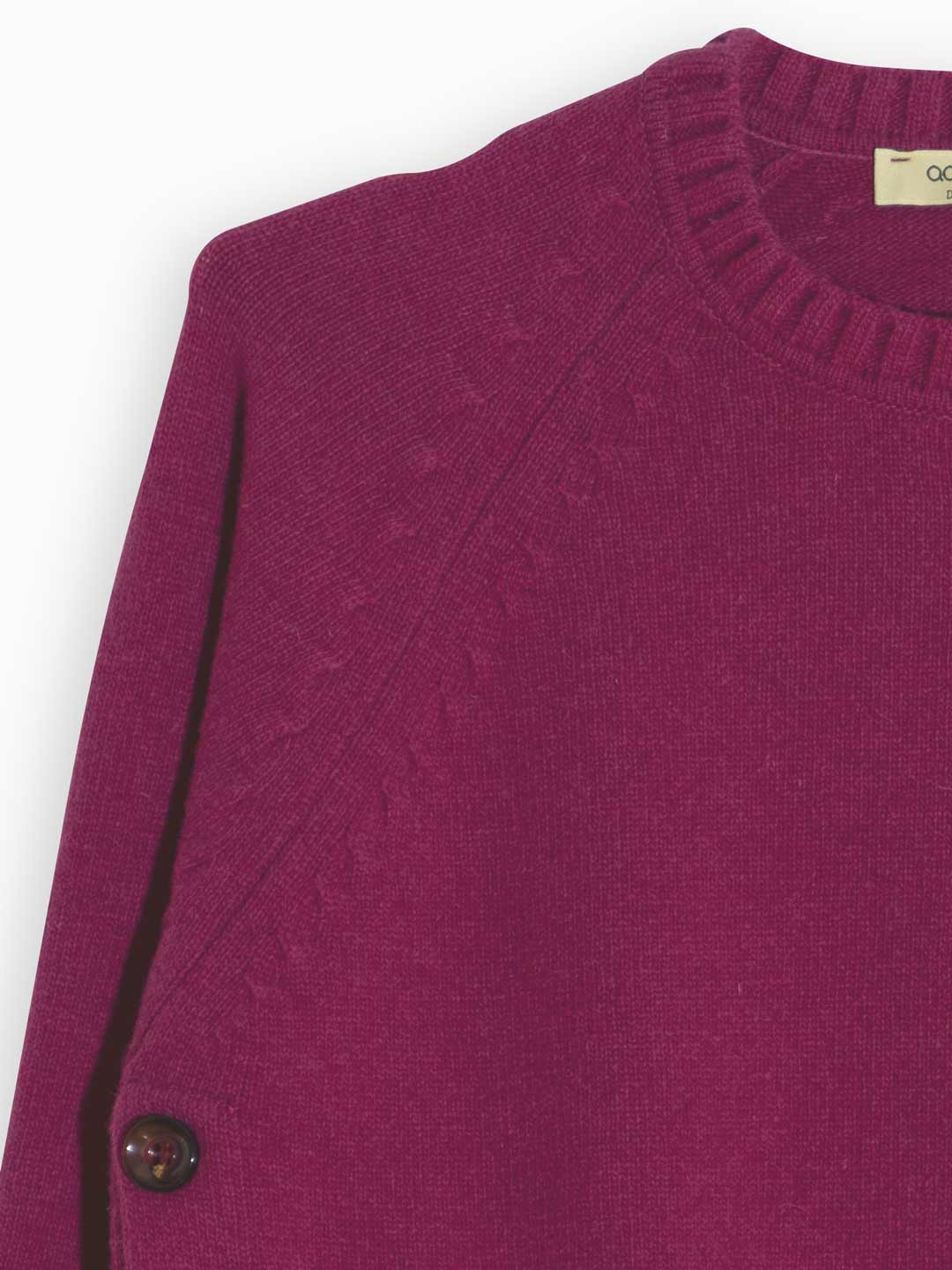 Jersey con aberturas y botones laterales en lana de cordero