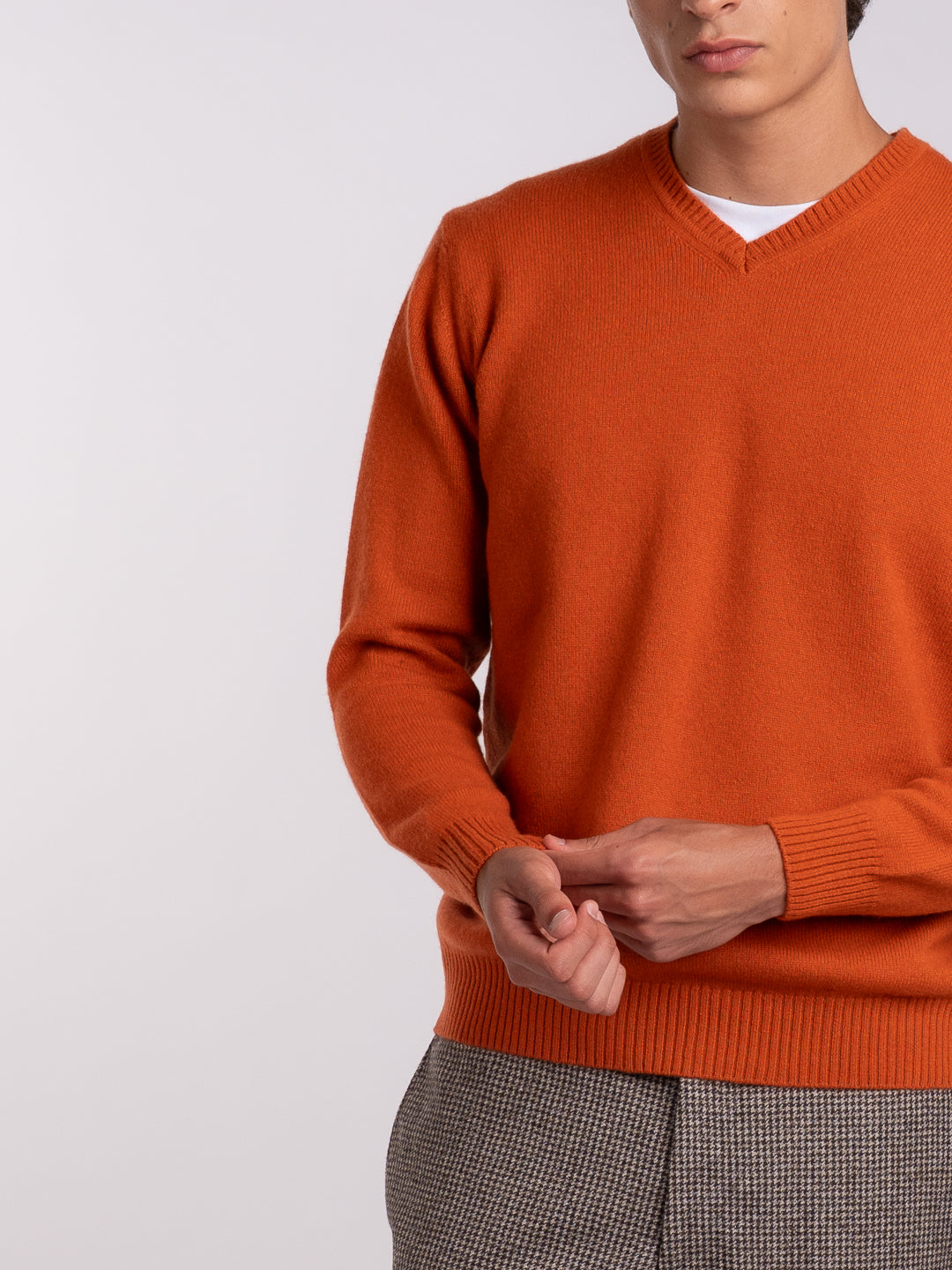 Men's terracotta-orange jersey knit pullover with ribbed trim